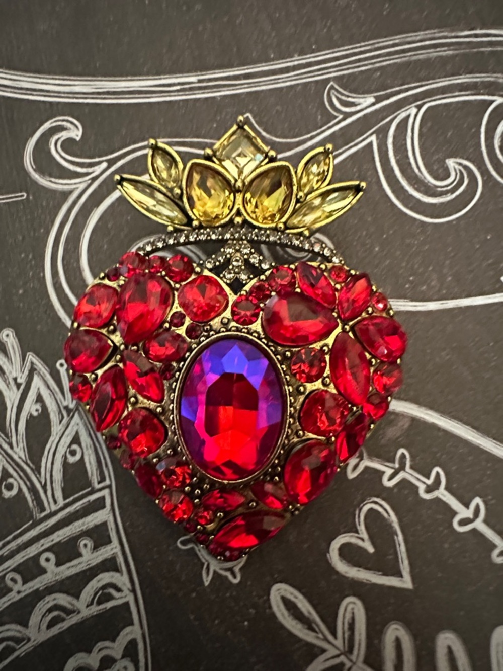 Gold-Tone Red Crystal Heart Brooch with Crown Accent
